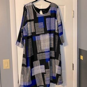 Black, blue, and white pattern dress